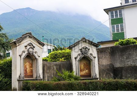 Old Christian Fresco Near Church Outside In Mandello Del Lario, Italy.