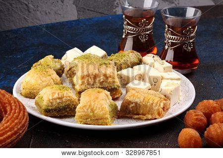 Baklava On Table. Middle Eastern Or Arabic Dishes. Turkish Dessert Baklava With Pistachio On Rustic