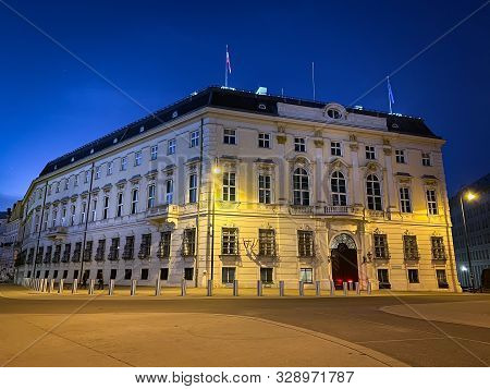 Austrian Chancellery By Night, Government Building At Ballhausplatz In Central Vienna