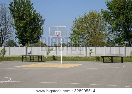 Basketball Court And Backboard With A Hoop. Yard Basketball.