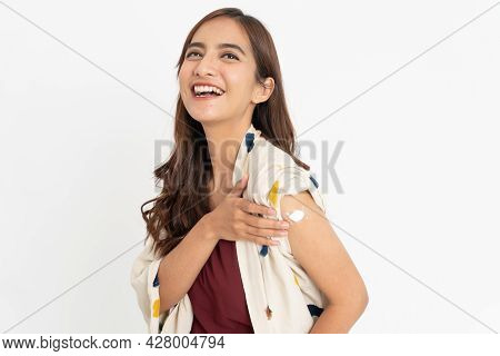 Asian Patient Getting Vaccinated Against Coronavirus By Doctor