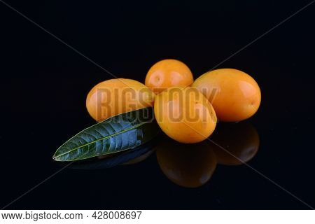 Bouea Oppositifolia,exotic Fruit Isolated On Black Background