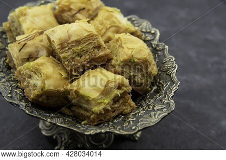 Tasty Sweet Baklava. Turkish Ramadan Dessert Baklava On A Decorative Plate. Baklava With Nuts And Ho