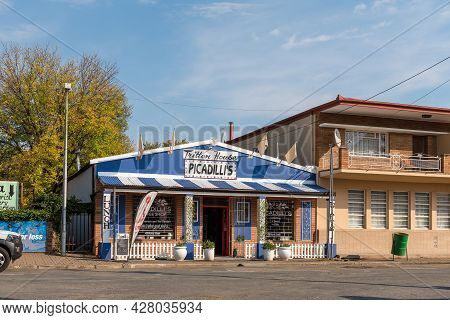 Middelburg, South Africa - April 22, 2021: A Street Scene, With The Picadillis Coffee Shop, In Midde