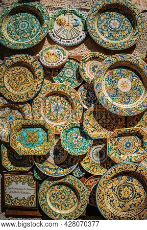 Erice, Sicily - June 8, 2021. Colorful Hand-decorated Ceramics. Traditional Tourist Suvenir. Street 