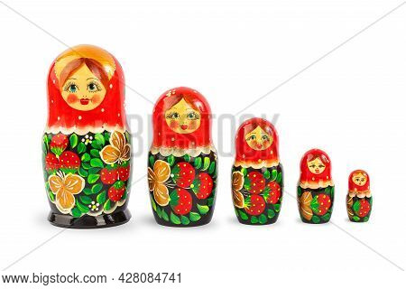 A Set Of Russian Folk Wooden Dolls Covered With Patterns, Isolate On A White Background