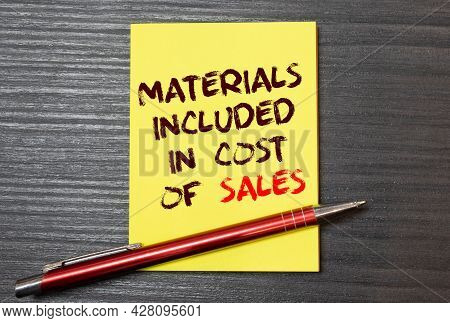 The Cost Of Fast Fashion. White Plastic Hangers, Hand With Calculator And Paper With Text. Creative 