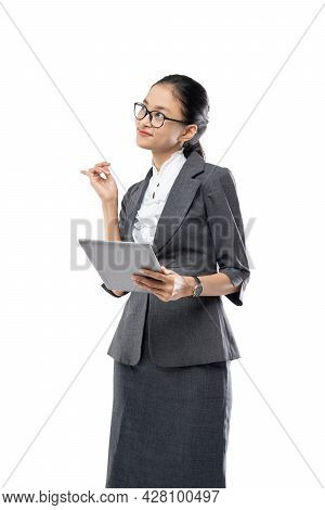 Young Pretty Business Woman Holding Tablet Getting An Idea