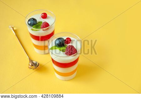 Panna Cotta With Raspberry, Italian Dessert Pana Cota With Berry Jam And Fresh Blueberries, Decorate