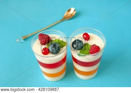 Panna Cotta With Raspberry, Italian Dessert Pana Cota With Berry Jam And Fresh Blueberries, Decorate