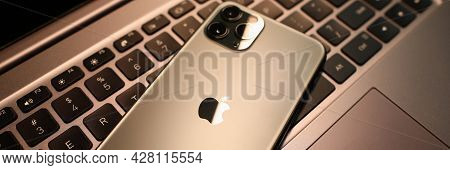 Minsk, Belarus - 30 July 2020: Iphone 12 Pro Max Lying On Laptop Keyboard Closeup