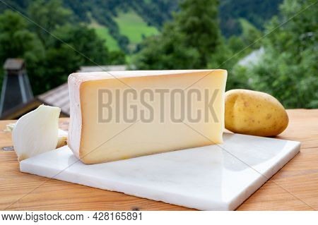 Tastes Of Savoia, French Cow Cheese For Gratin Abondance, Potatoes And French Mountains Village In H