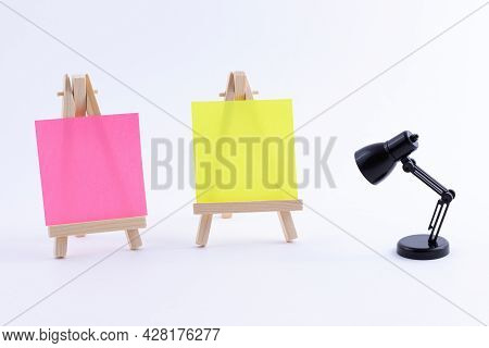 Two Wooden Easels Miniature With Blank Colored Square Canvas Or Memo Paper - Mockup. Mini Wooden Sta
