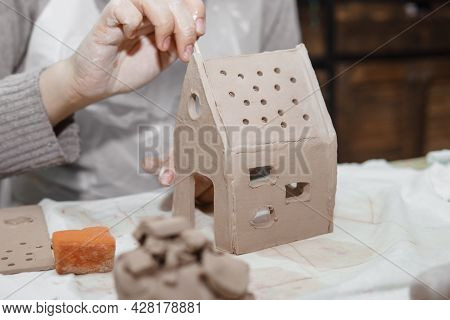 Womens Hands Knead Clay, Drawing Elements Of The Product. Production Of Ceramic Products At The Mast