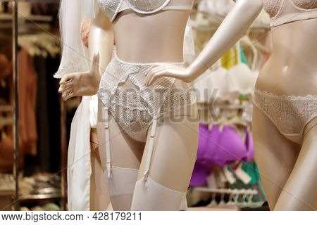 Female Mannequins In Underwear. Lingerie Store, Lace Bra, Panties And Stockings In A Shop