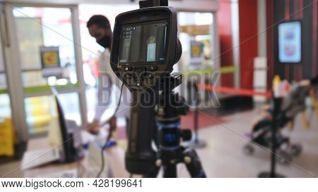 Temperature Check At A Supermarket, Grocery Store With A Thermal Imaging Camera Installed. Image Mon