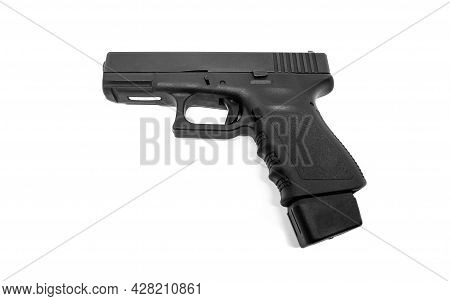 9mm Pistol With Long Magazine On White Background