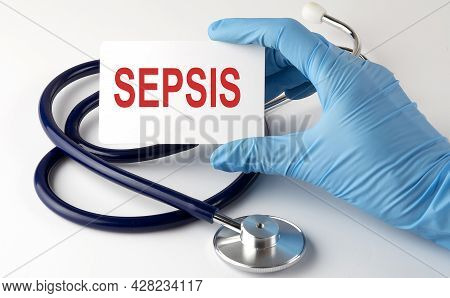 Card With Sepsis Supplies, Pills And Stethoscope. Medical Concept.