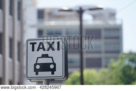 Text And Pictures On Cab Stand Signs In The City