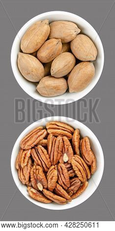Pecan Nuts, Shelled And Unshelled, In White Bowls, Over Gray. Whole Pecans And Pecan Halves, Seeds A