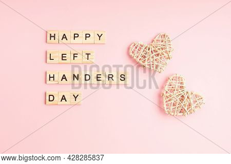 Text Happy Left Handers Day Written With Wooden Letters And Heart