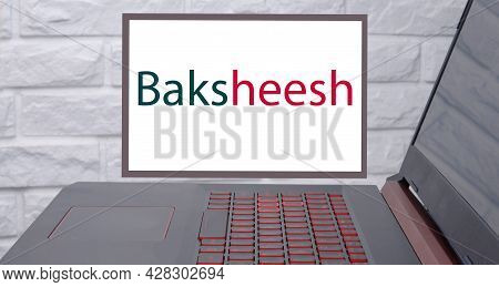 Baksheesh Text Near The Desktop As A Reminder Of Compliance With The Laws. The Concept Of No Bribe S