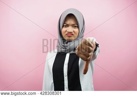 Beautiful Young Asian Muslim Woman Pouting, Belittling, Disappointed, Dissatisfied, Not Good, Bad Jo