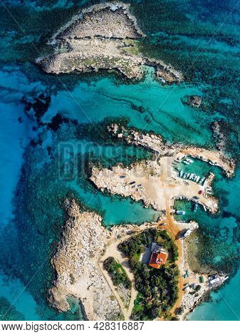 Aerial Drone View Of Green Bay Beach In Cyprus Island With Turquoise Mediterranean Sea