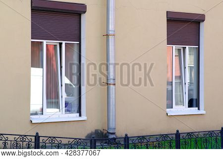 Roller Shutters On The Windows From Thieves And Vandals. Protective Blinds With Vandal-proof Propert