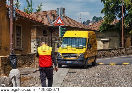 Bergamo, Italy - May 22, 2019: Minivan Of The Dhl Company. Dhl International Gmbh Is A German Courie