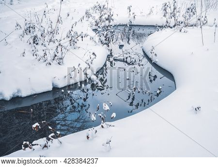 Green Wellspring, The Source Of Natural Mineral Water In The Forest Of Mari El, Russia, Winter Natur