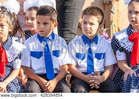 Krasnodar, Russia - September 1, 2020: First-form Schoolchildren At School On Holiday Of Beginning O