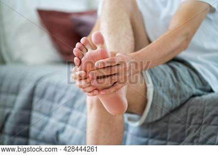 Foot Pain, Man Suffering From Feet Ache