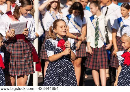 Krasnodar, Russia - September 1, 2020: First-form Schoolgirl At School On Holiday Of Beginning Of El