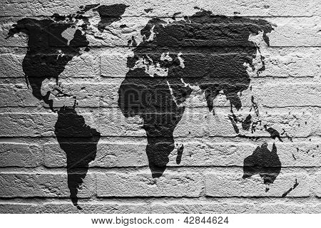 Brick Wall With A Painting Of A Flag, World Map