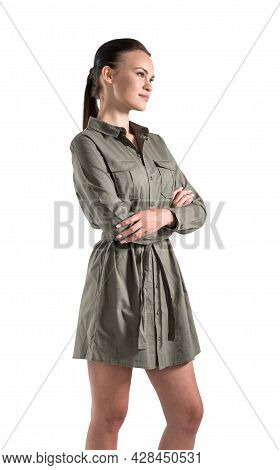 Confident Attractive Business Woman In Crossed Arm Pose Is Pondering How To Optimize Business Proces