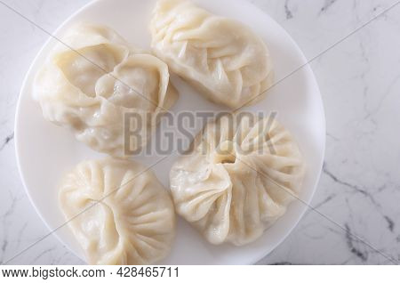  a Delicious, Diet Dish. Steam Dumplings. Manti With Pumpkin. Khinkali Georgian. Korean Dumplings