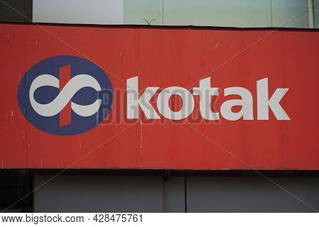 Sign Board: Kotak Mahindra Bank Sign Board Showing The Logo And Text. Kotak Mahindra Bank Is An Indi