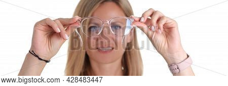 Portre Young Woman With Poor Eyesight Holds Glasses In Hands