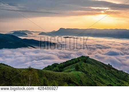 Spring Sunrise And The Sea Of Clouds In Muntele Găina, Carpathian Mountains, Romania