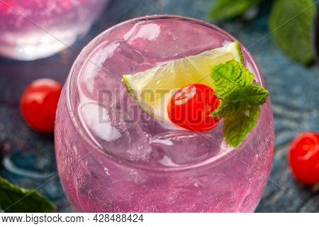 Cherry Limeade Or Lemonade In Drinking Glass. Refreshing Summer Drink.