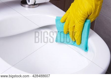 Cleaning  Rimless Toilet Close-up,  Hand In  Glove Close-up Wipes  Toilet Bowl