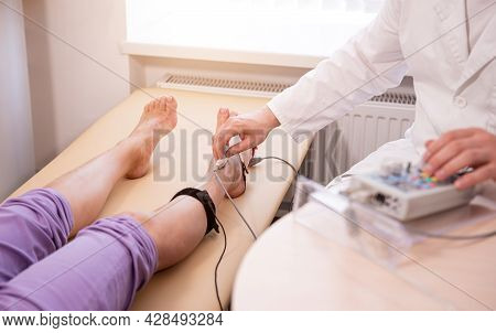 Patient Nerves Testing Using Electromyography At Medical Center