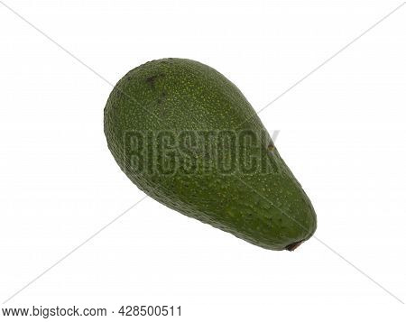 A Whole Green Avocado Is Isolated On A White Background.