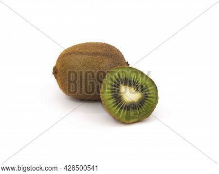 A Cross-cut Slice Of Green Kiwi Isolated On A White Background Next To A Whole Kiwifruit In The Peel