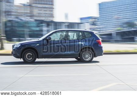 Moscow, Russia - July 2021: Blue Bmw X3 Suv Car On The City Road. Fast Moving Vehicle On Moscow Stre