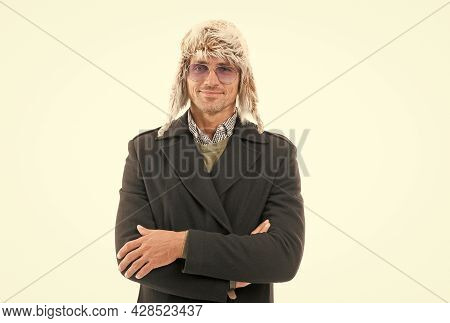 Feeling Cozy. Unshaven Man In Coat And Earflap Hat. Confident And Handsome Guy Feel Comfortable. Cha