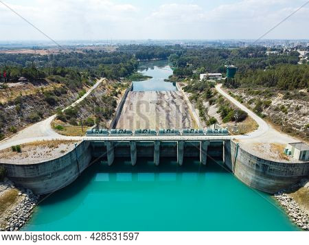 Aerial View Of Water Reservoir, Concrete Rapid And Closed Reservoir Locks Of A Dam. Berdan Dam, Tars