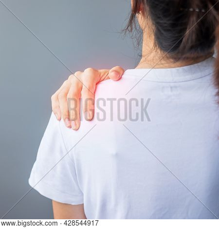Woman With Her Shoulder Sprain, Muscle Painful During Overwork. Girl Having Body Problem After Wake 