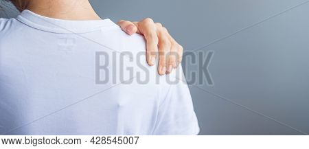 Woman With Her Shoulder Sprain, Muscle Painful During Overwork. Girl Having Body Problem After Wake 